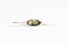 Minimālistiska dzintara piespraude