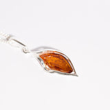 Radiant Curve Amber Pendant Necklace