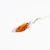 Sleek Amber Twist Pendant Necklace